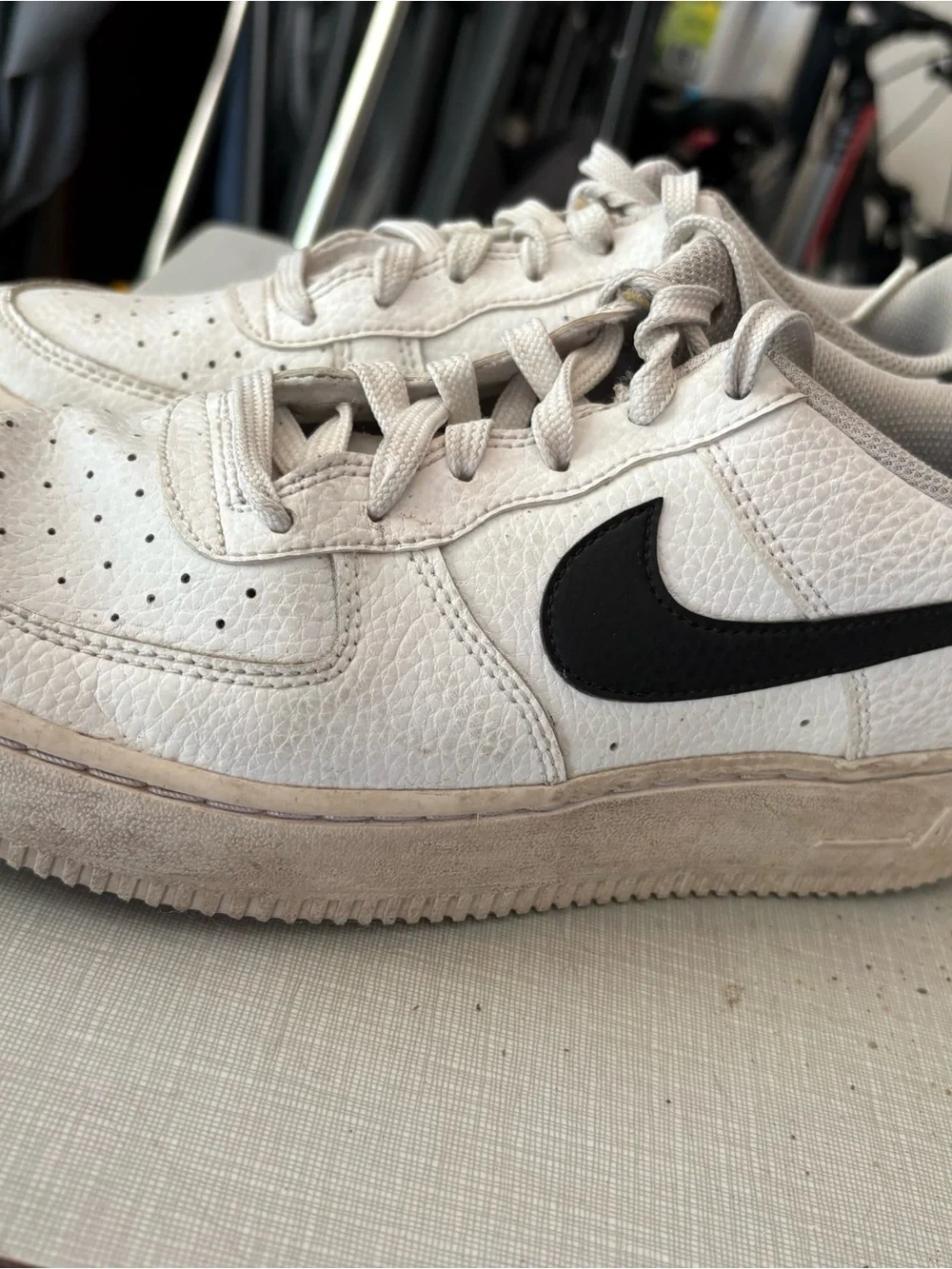 Nike White Leather Sneakers with Black Swoosh